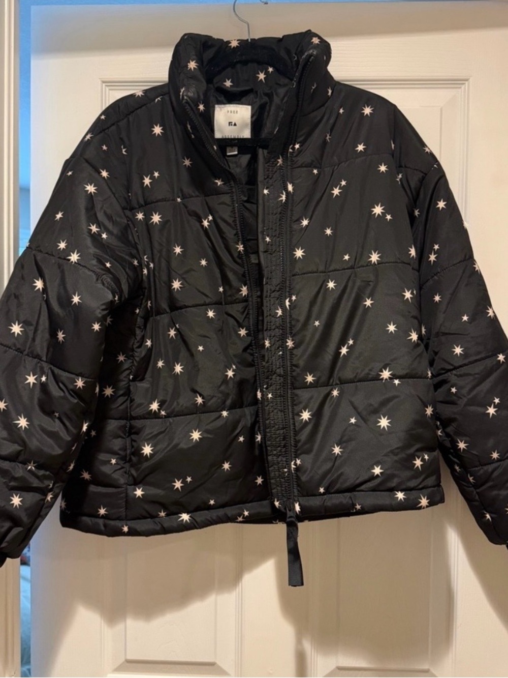 Black Puffer Jacket with White Star Print